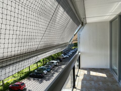 Balcon avec store