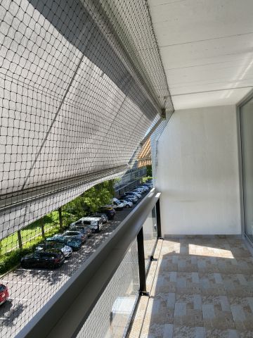 Balcon avec store
