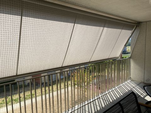 Balcon avec store
