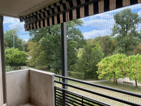 Balcon avec store